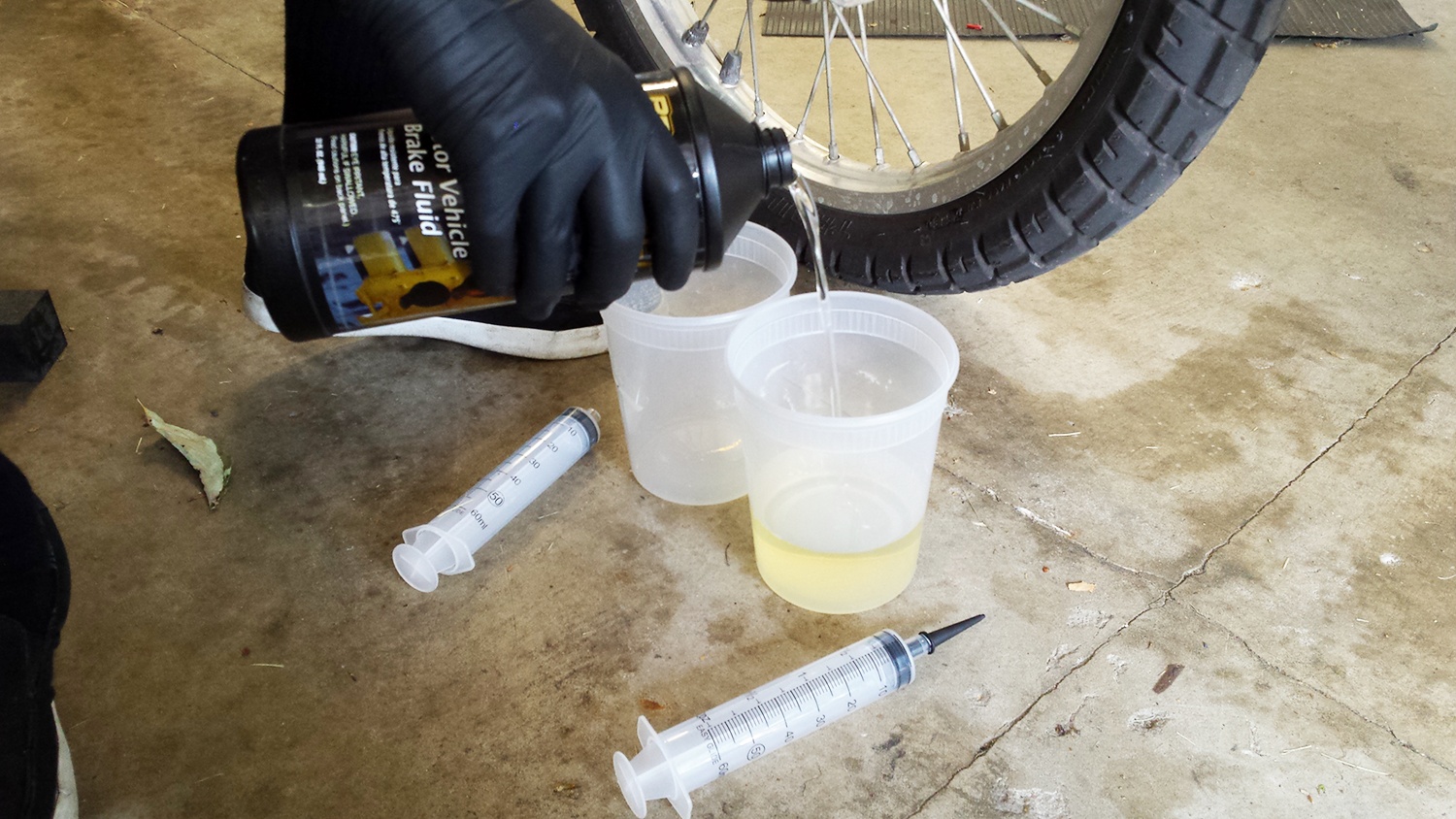 Pouring Brake Fluid